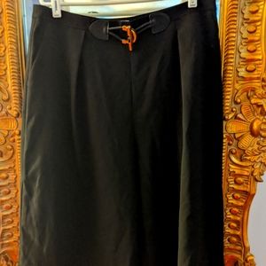 Calvin Klein wide leg cropped pants gold accent.